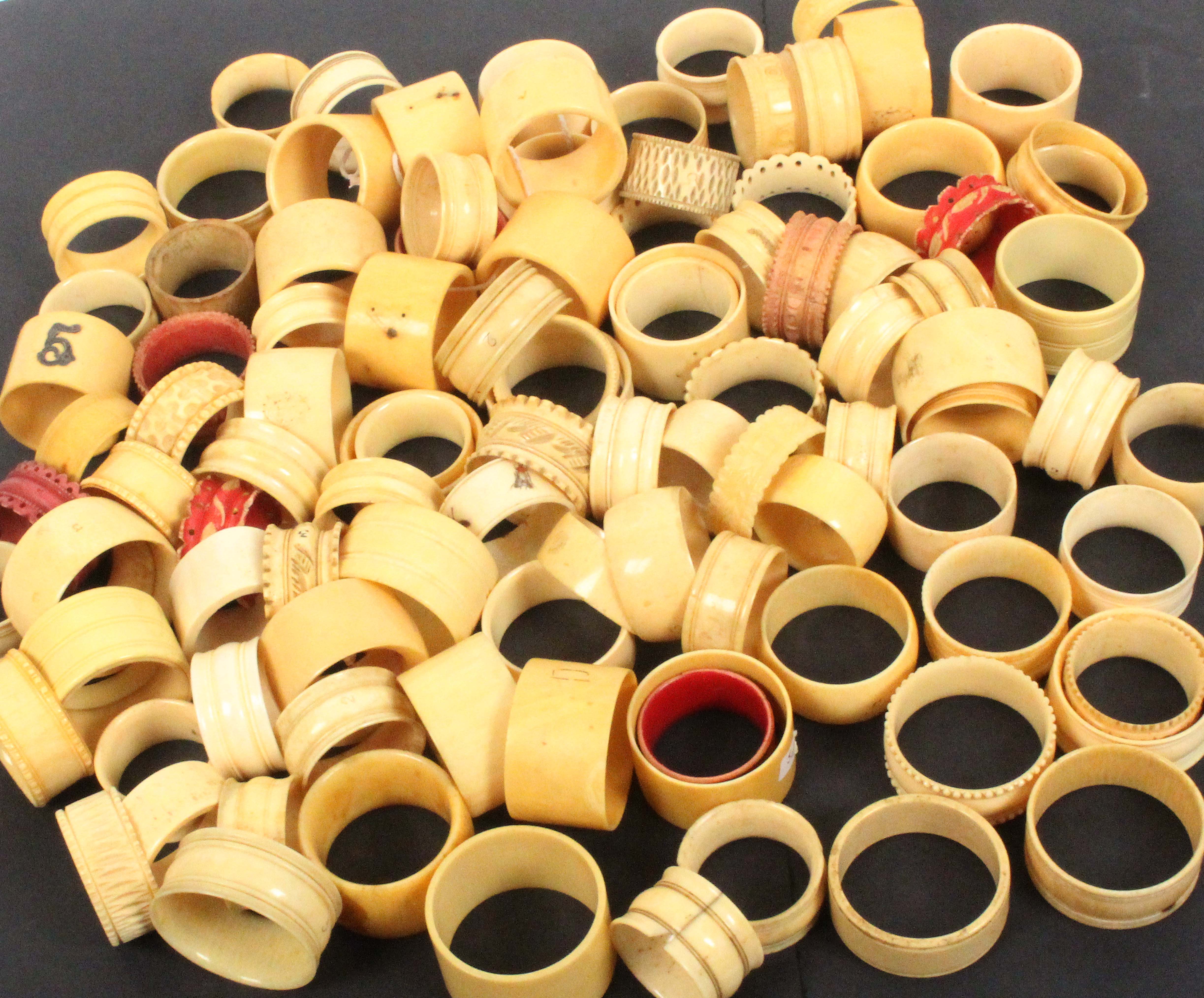 Napkin rings – one hundred plus, 19th Century ivory and bone examples.     (100+)