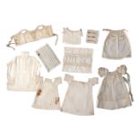 A fine group of sample miniature clothing and accessories, ten pieces, Circa 1820, comprising a