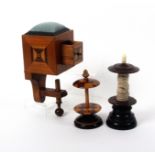 A continental box form pin cushion clamp and two table reels, the clamp with geometric inlays and