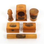 Mauchline ware – six pieces, comprising a mantel clock form money box (Bournemouth), 11cms, a