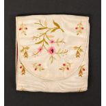 A mid 19th Century needle packet and needle flannel wallet, in ivory watered silk embroidered in