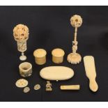 A mixed lot of early 20th Century ivory pieces, comprising two Chinese multiple puzzle balls on