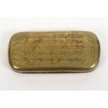 An 18th Century brass tobacco box with almanach, by Carl Norman, the box of curved end rectangular