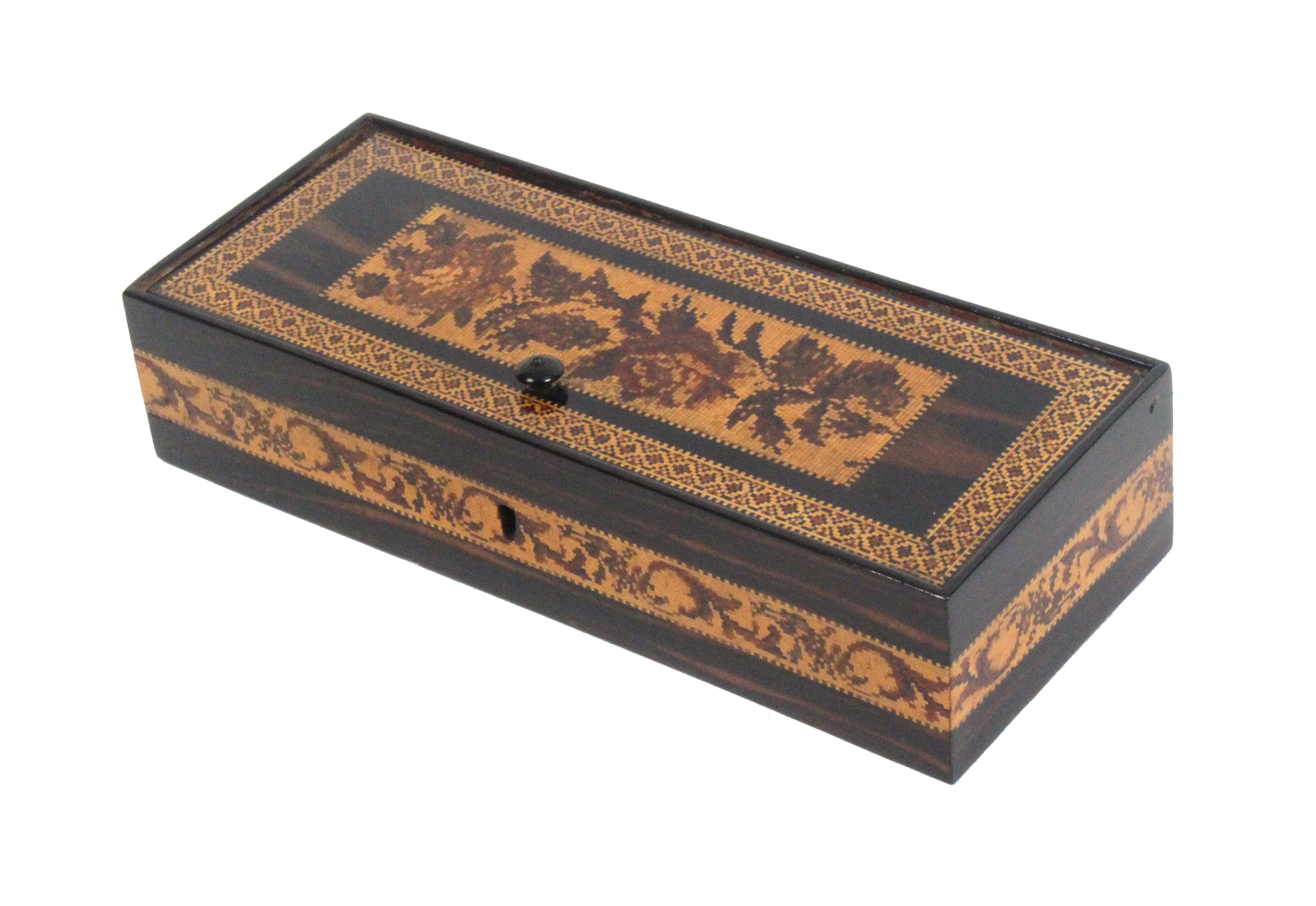 A Tunbridge ware coromandel wood pin hinge box, of rectangular form, the lid with a floral mosaic