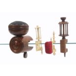 Four 19th Century sewing clamps, comprising a large mahogany cylinder form example with roundel