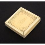 An early 19th Century Anglo Indian ivory Tangram puzzle, the square ivory box with sliding lid