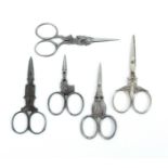 Five pairs of 19th Century animal and architectural steel scissors, comprising a pair in the form of