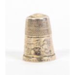 A silver thimble commemorating the Great Exhibition, the frieze with a view of Crystal Palace, the