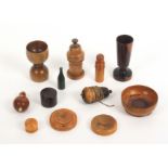 Treen etc – twelve pieces, comprising a lignum vitae acorn form plumb bob, 8cms, a similar bowl with