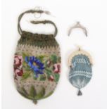 A 19th Century beadwork bag and a purse, the bag in floral coloured beadwork on a clear ground