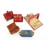 Four late 19th Century novelty sewing companions, comprising an example in red silk and plush in the