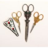 Three pairs of scissors, comprising a steel pair possibly for the Turkish market the cornucopia