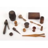 A collection of treen, comprising a 19th Century school clicker used to help children march and obey