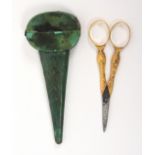 A pair of early 19th Century gold mounted scissors in worn shagreen case, the steel blades with leaf