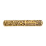 A late 18th Century gilded filigree cylinder bodkin case, the body of quill work scrolls, the