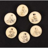 A set of seven late 19th Century ivory buttons, with raised rims and carved in relief three