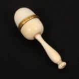 An early 19th Century ivory thimble case and thimble, probably Palais Royal, the egg form case