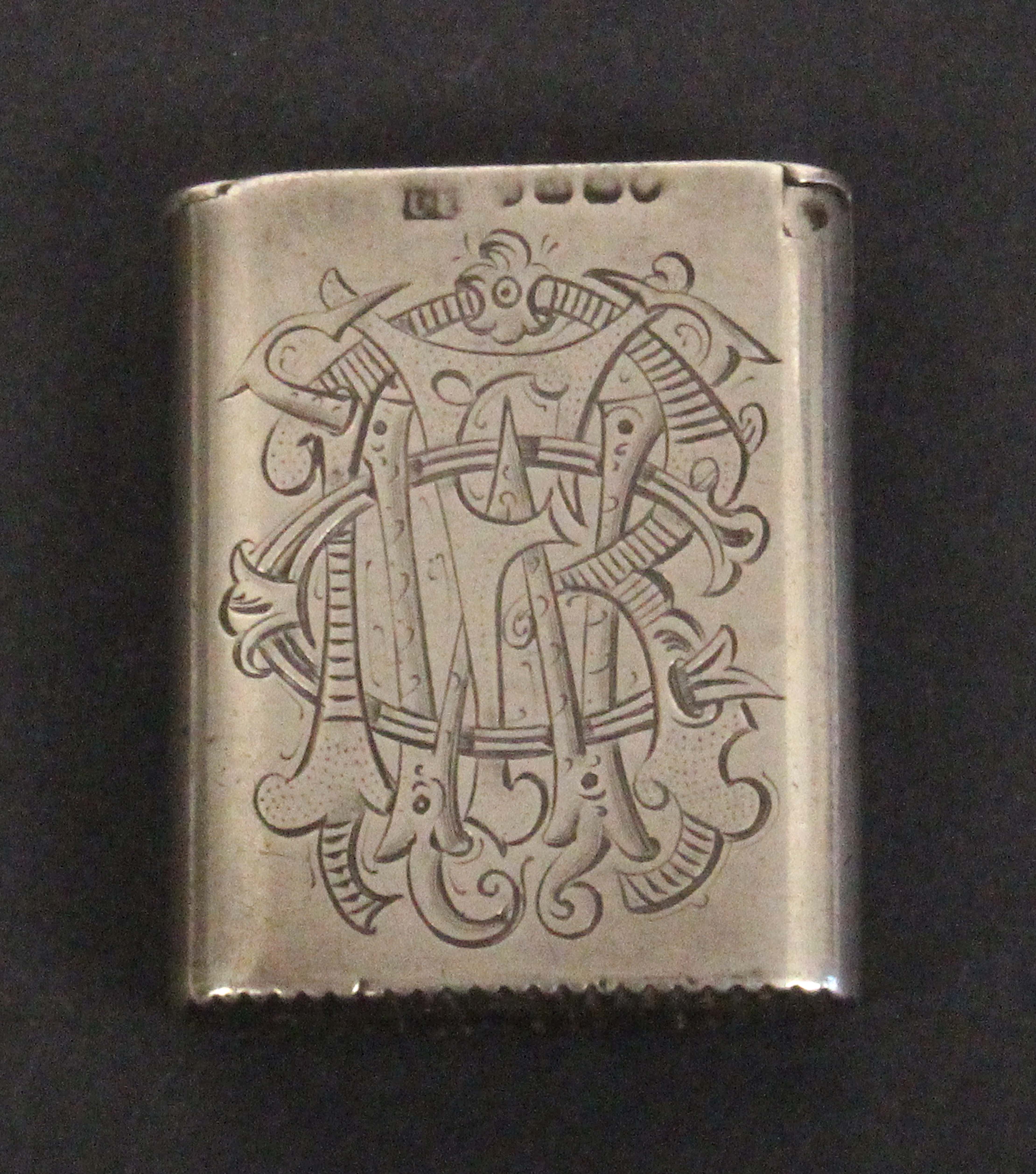A 19th Century white metal and enamel vesta case, one side with an inset enamel panel of a pipe - Image 2 of 2