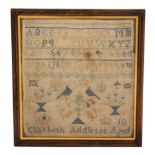A simple early 19th Century sampler, worked with rows of alphabets and numerals over birds,