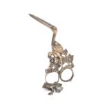 A pair of 19th Century silver ribbon scissors in the form of a stork, the legs amid flowers and with