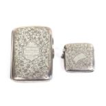 The silver cigarette case and vesta case belonging to James E.W. Robinson, the cigarette case with