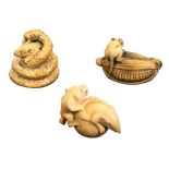 Three early 20th Century ivory netsuke, comprising a rat on a corn cob, 4cm, a snake coiled around a