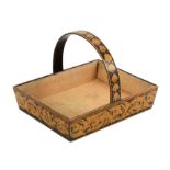 An attractive Regency pen work sewing basket, of rectangular form, the sloping sides with a leaf