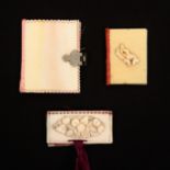 Three 19th Century ivory needle books, comprising a plain example with hinged catch, 6cms, another