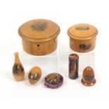 Mauchline ware – seven pieces, comprising a circular reel box (coloured ferns), three of six bone