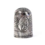 A rare Charles II commemorative silver thimble, with two oval panels, one depicting a wedding bust