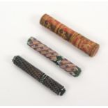 Three cylinder needle cases, comprising two examples covered in decorative geometric coloured