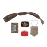 Four purses and a note book, comprising a silver chain mail draw string bag, 21cm, a brown and steel