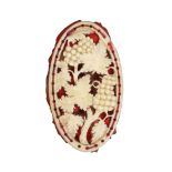 A fine mid 19th Century ivory pin cushion of oval form, pierced and carved as a fruiting grape