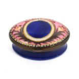 A late 18th Century oval English enamel box, the lid with a blue circular panel inscribed in gilt ‘