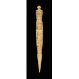 A fine early 19th Century carved ivory cylinder needle case, terminating in a stiletto, the body