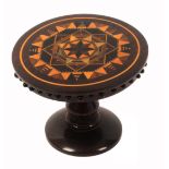 A good Tunbridge ware rosewood pin wheel, in the form of a miniature circular table, probably Thomas