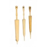 Three bone needle cases incorporating Stanhopes, in the form of furled umbrellas (Peterborough