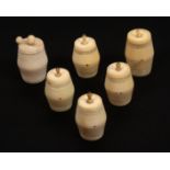 A group of six 19th Century ivory cotton barrels, comprising a matched set of four 3.5cm high and