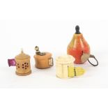 Four tape measures, comprising a painted wooden example as a pear, printed tape, 4.7cms, a boxwood