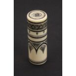 A 19th Century Anglo Indian ivory sewing companion, of cylinder form with engraved black lac