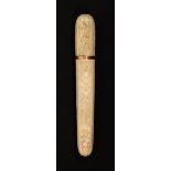A late 18th early 19th Century carved ivory bodkin case, of cylinder form carved with panels of
