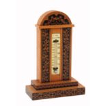 A Tunbridge ware desk thermometer by Edmund Nye, the satinwood stepped base edged in geometric