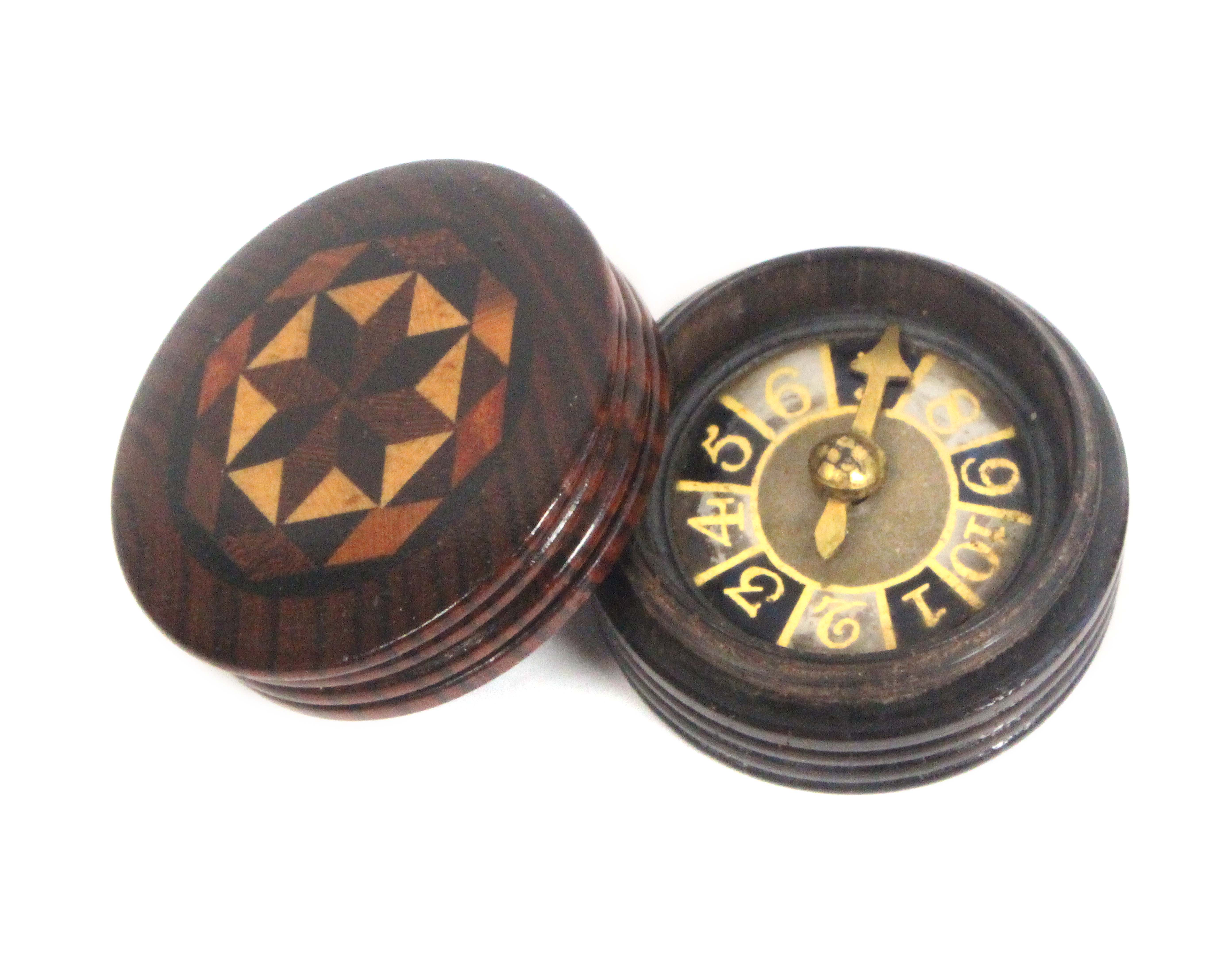 A scarce Tunbridge ware circular whist marker, the verre eglomise dial with brass hand contained