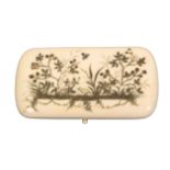 A late 19th Century French ivory etui, of rounded corner rectangular form the lid in gilt lacquer