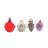 Four 19th Century miniature glass scent bottles, comprising a circular ruby glass example with screw