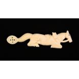 A 19th Century carved ivory opium spoon, carved as a horse at rest the tail terminating in the