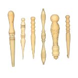 Six 19th Century bone and ivory stilettos, comprising a finely carved reversible example the