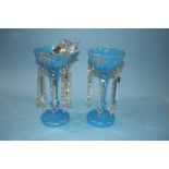 A pair of Victorian blue lustres with clear glass drops, 29cm high