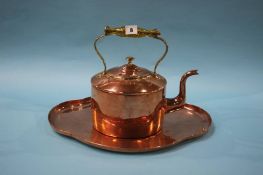 A 19th century copper tray and a kettle