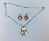 A Moonstone set pendant and a pair of earrings